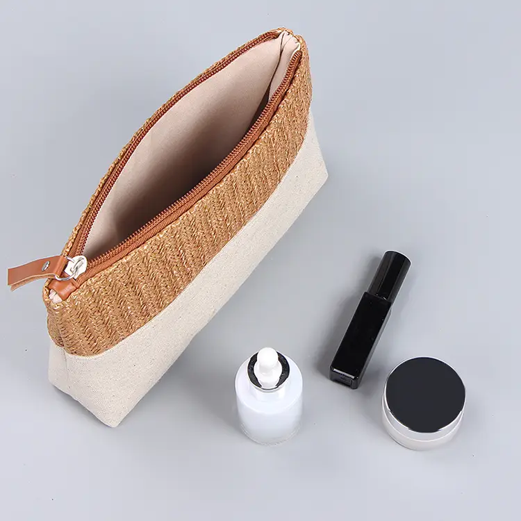 Sustainable straw cosmetic bag paired with FSC-certified recycled kraft tags